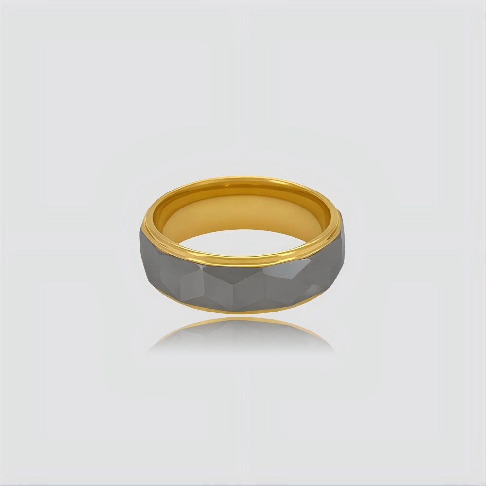 The Prismatic Pillar Precision-engineered ring featuring faceted Aerospace-grade Tungsten and 18K Gold PVD coating.