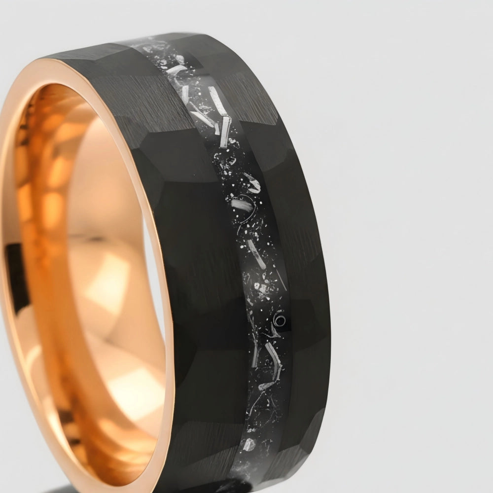 Macro detail of faceted geometric edges on The Celestial Rift showcasing Authentic Muonionalusta Meteorite and 18K Rose Gold PVD coating.