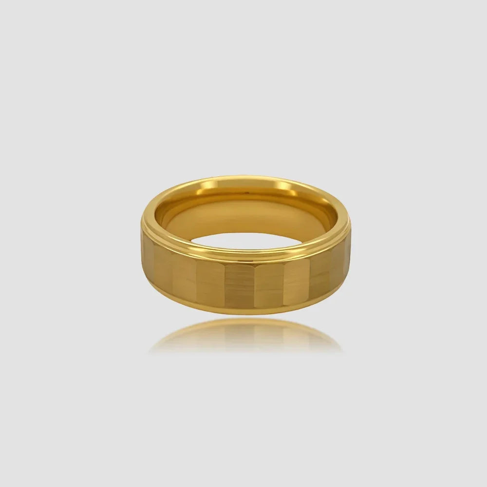 The Titan Precision-engineered ring featuring a multi-faceted surface and 18K Gold PVD coated Aerospace-grade Tungsten.