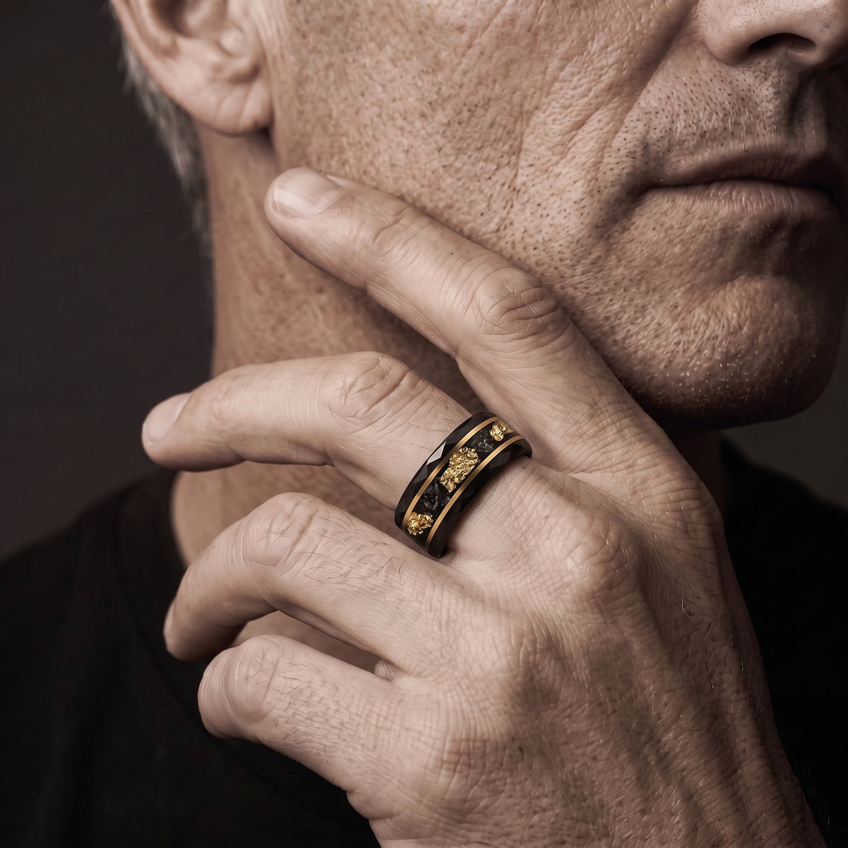 The_Void_Fragment_Hammered_Black_Tungsten_Meteorite_18K_Gold_PVD_Band-close-up-worn-on-hand