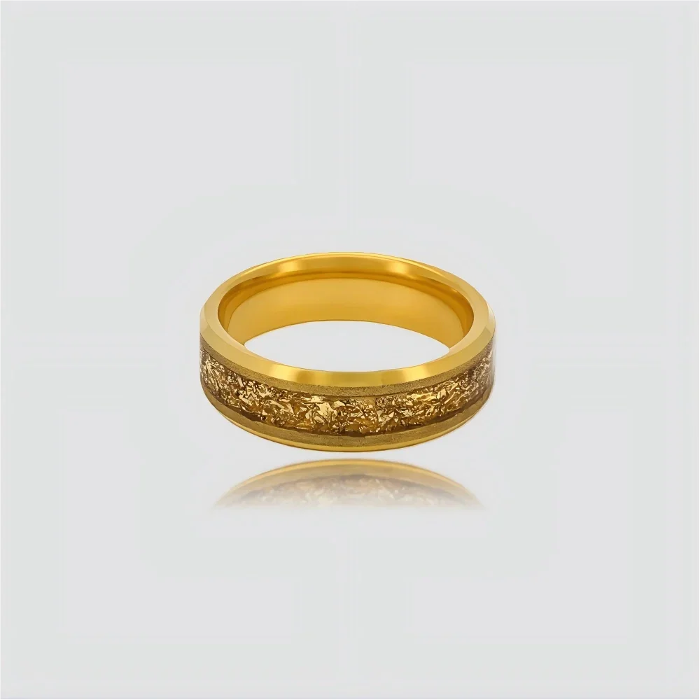 The Gilded Grain Precision-engineered ring featuring sandblasted finish and 18K Gold PVD coated gold foil inlay.