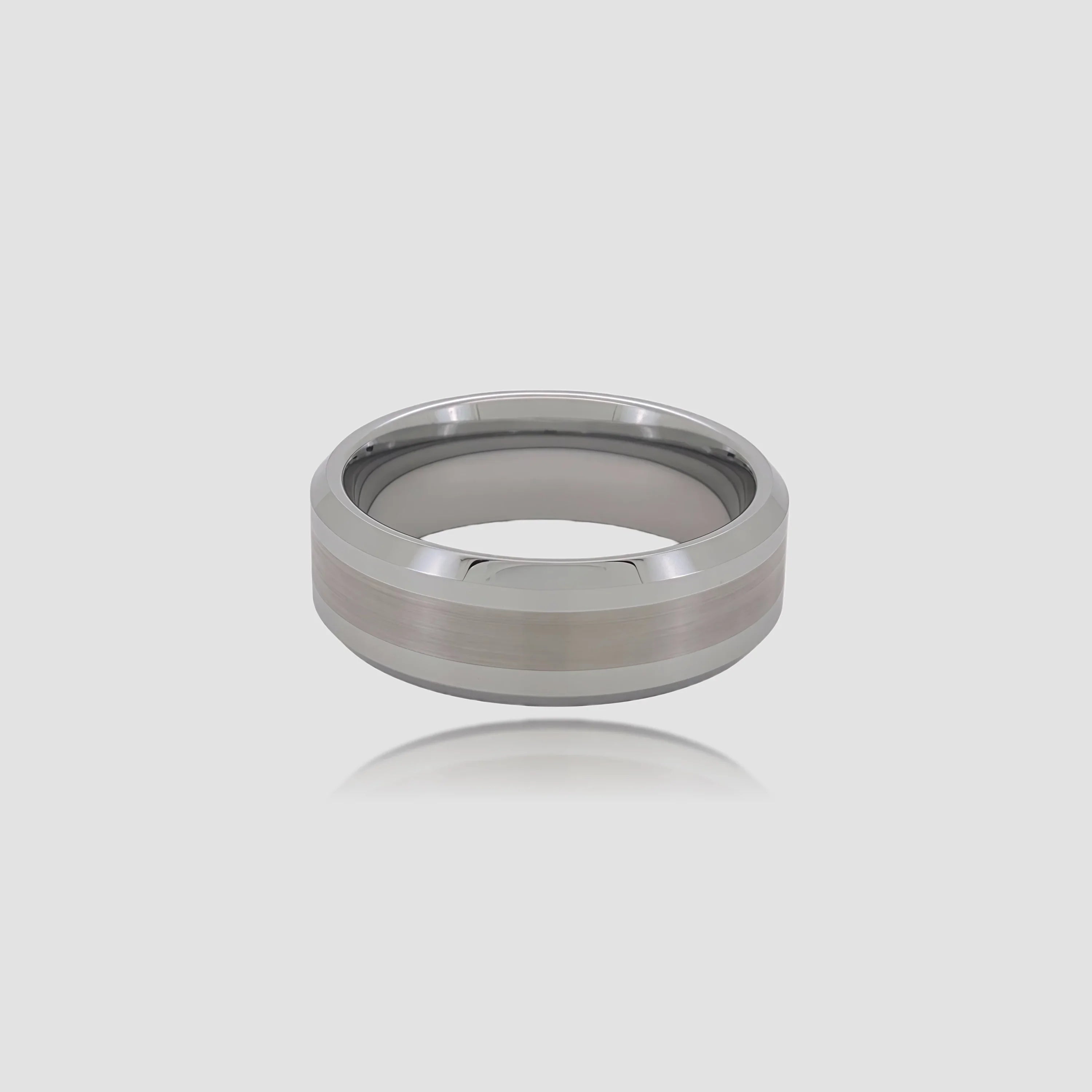 The Obelisk Precision-engineered ring featuring polished Aerospace-grade Tungsten and a central brushed finish.