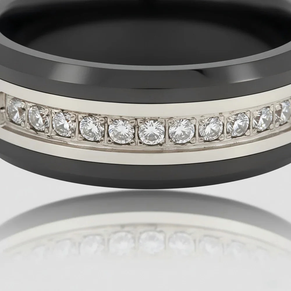 Macro detail of beveled edges and a precision-milled stone channel on The Obsidian Prism showcasing polished black ceramic.